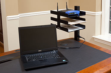 power organizer tower with power outlets at the desk top