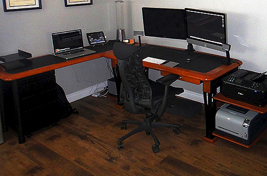 iMac attached to a monitor Arm